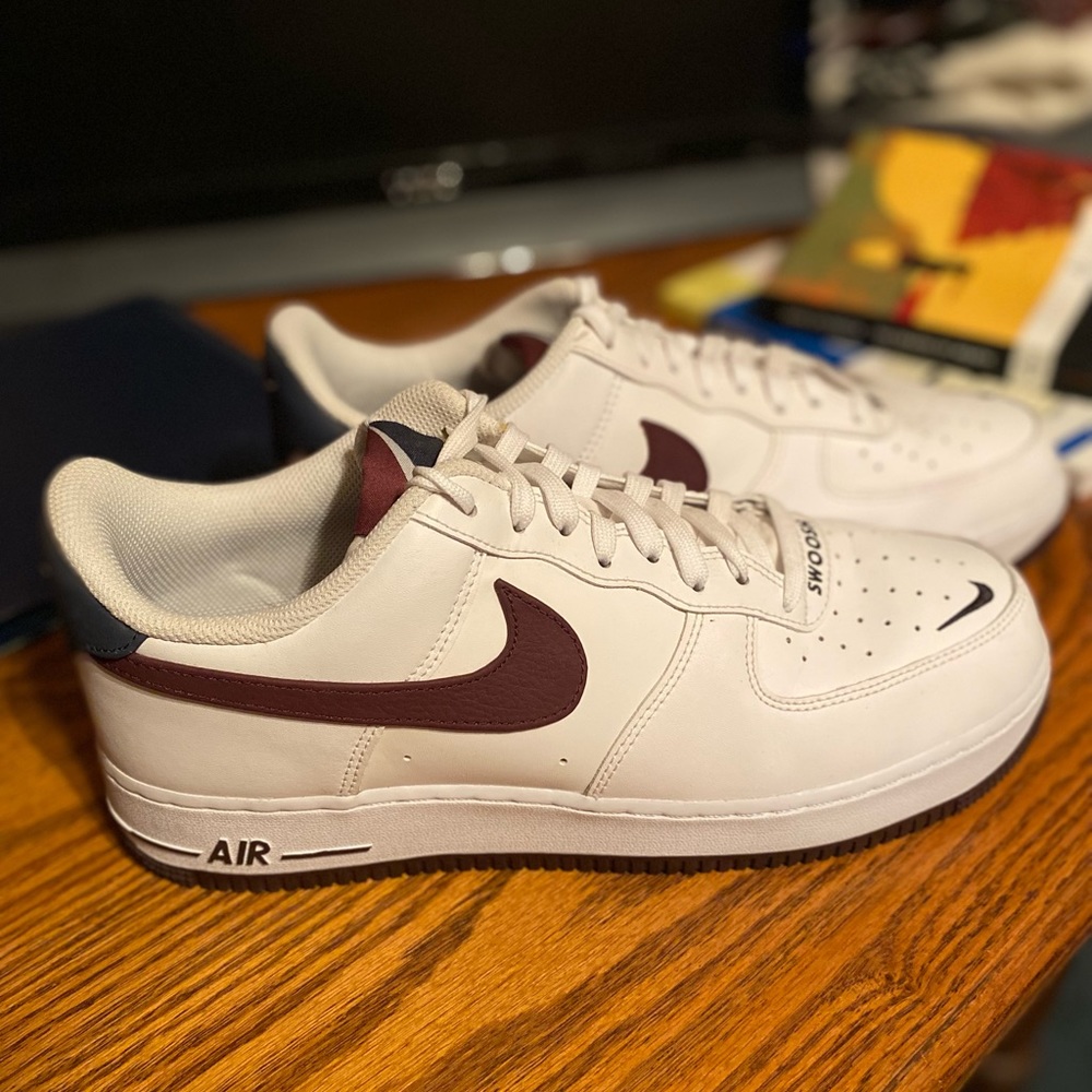 Nike “Swoosh” Air Forces